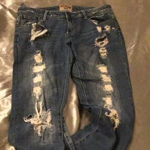 Women’s distressed Genuine Thrill jeans